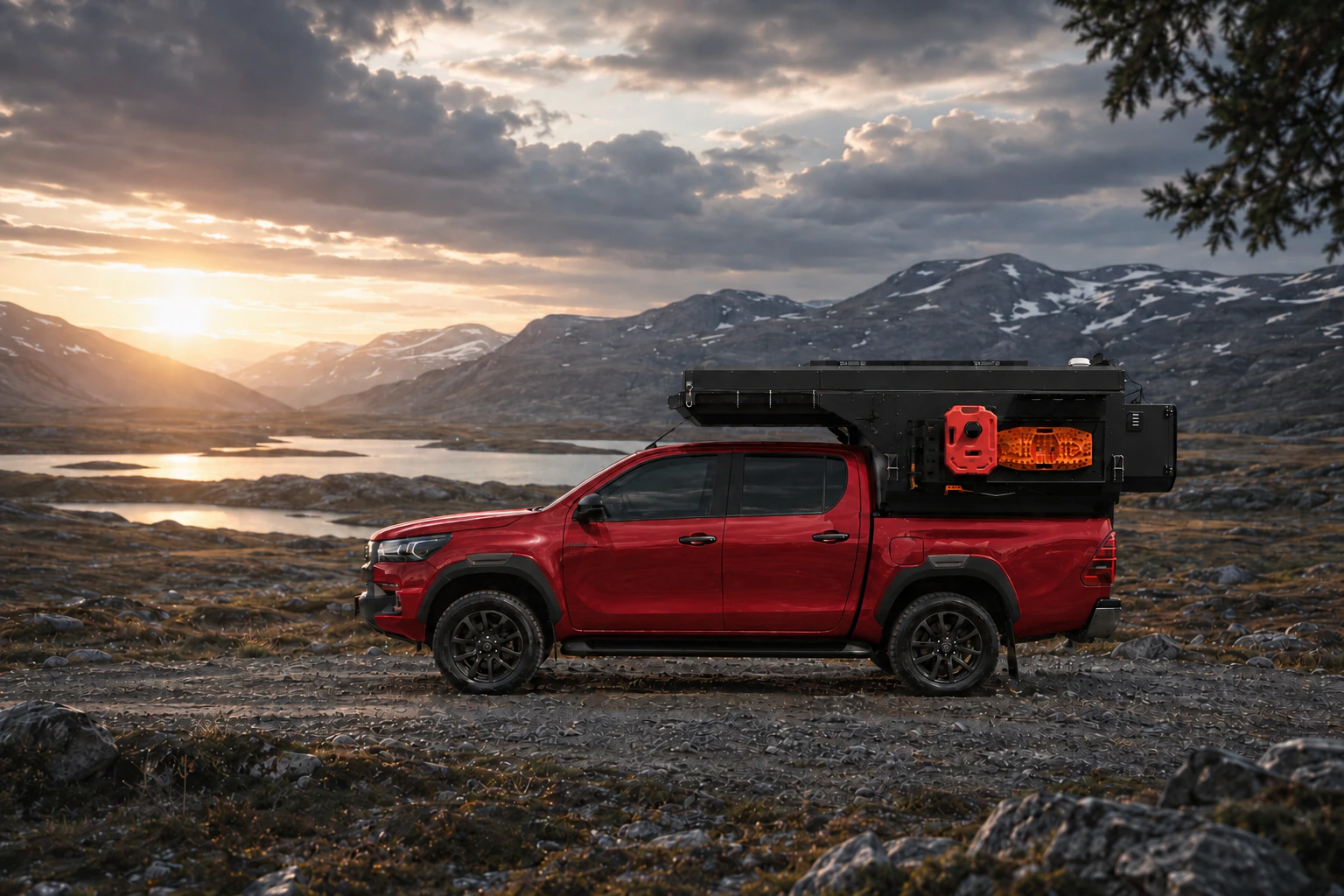 Side view of the Toyota Hilux in red with WOLF ADVENTURE in Matt black.