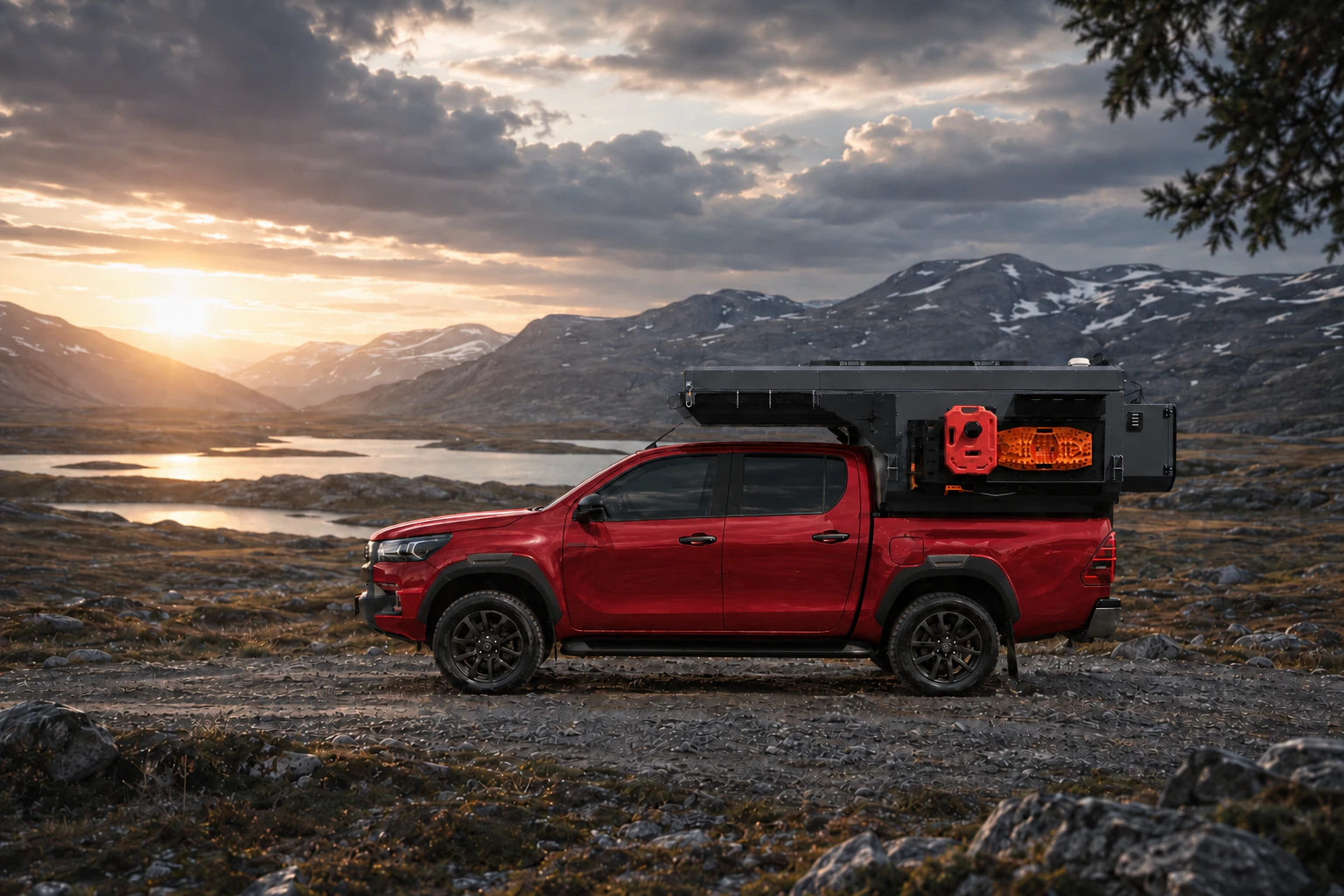 Side view of the Toyota Hilux in red with WOLF ADVENTURE in Graphite.