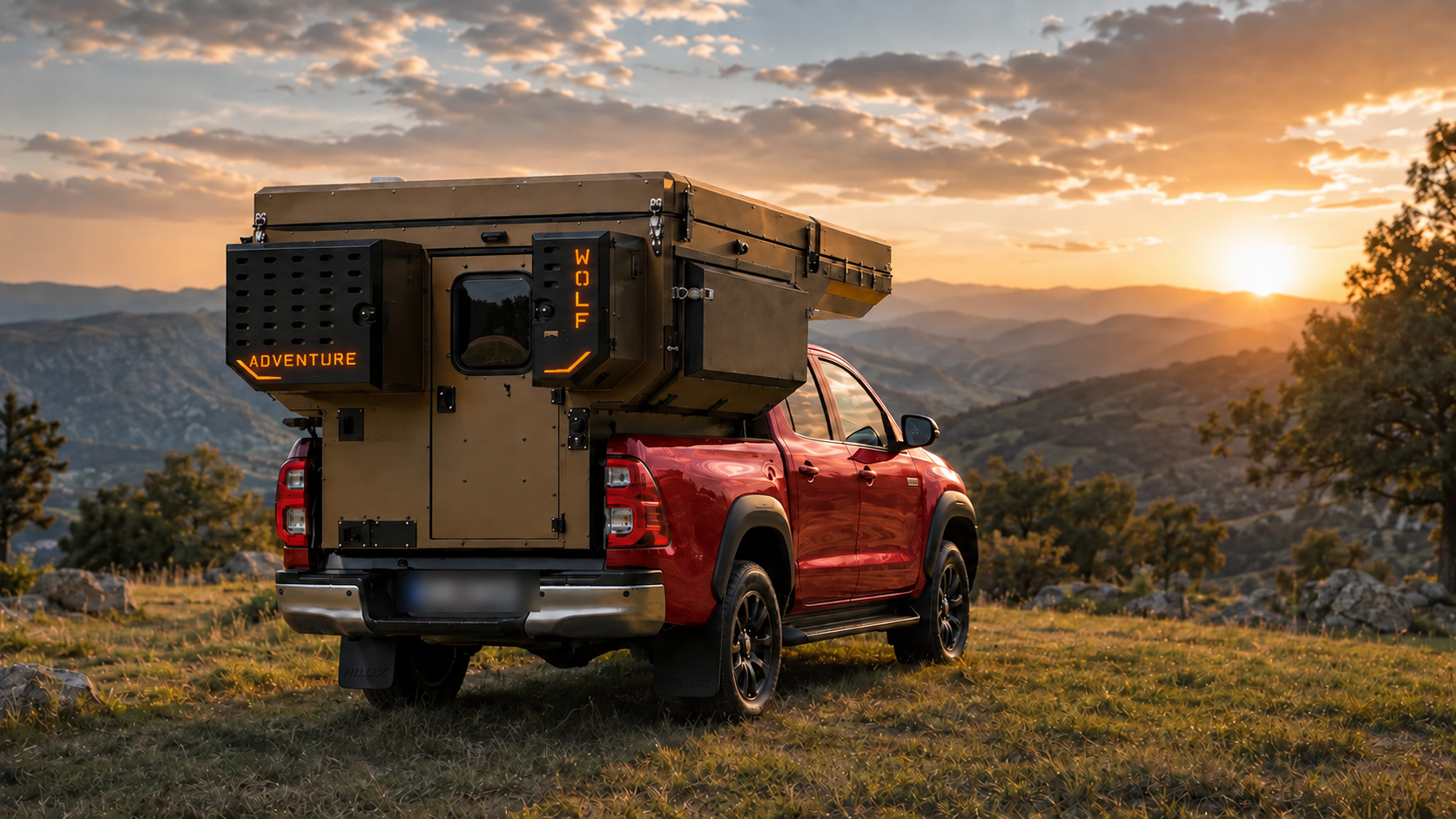 Rear three-quarter view of the Toyota Hilux in red with WOLF ADVENTURE in Bronze.