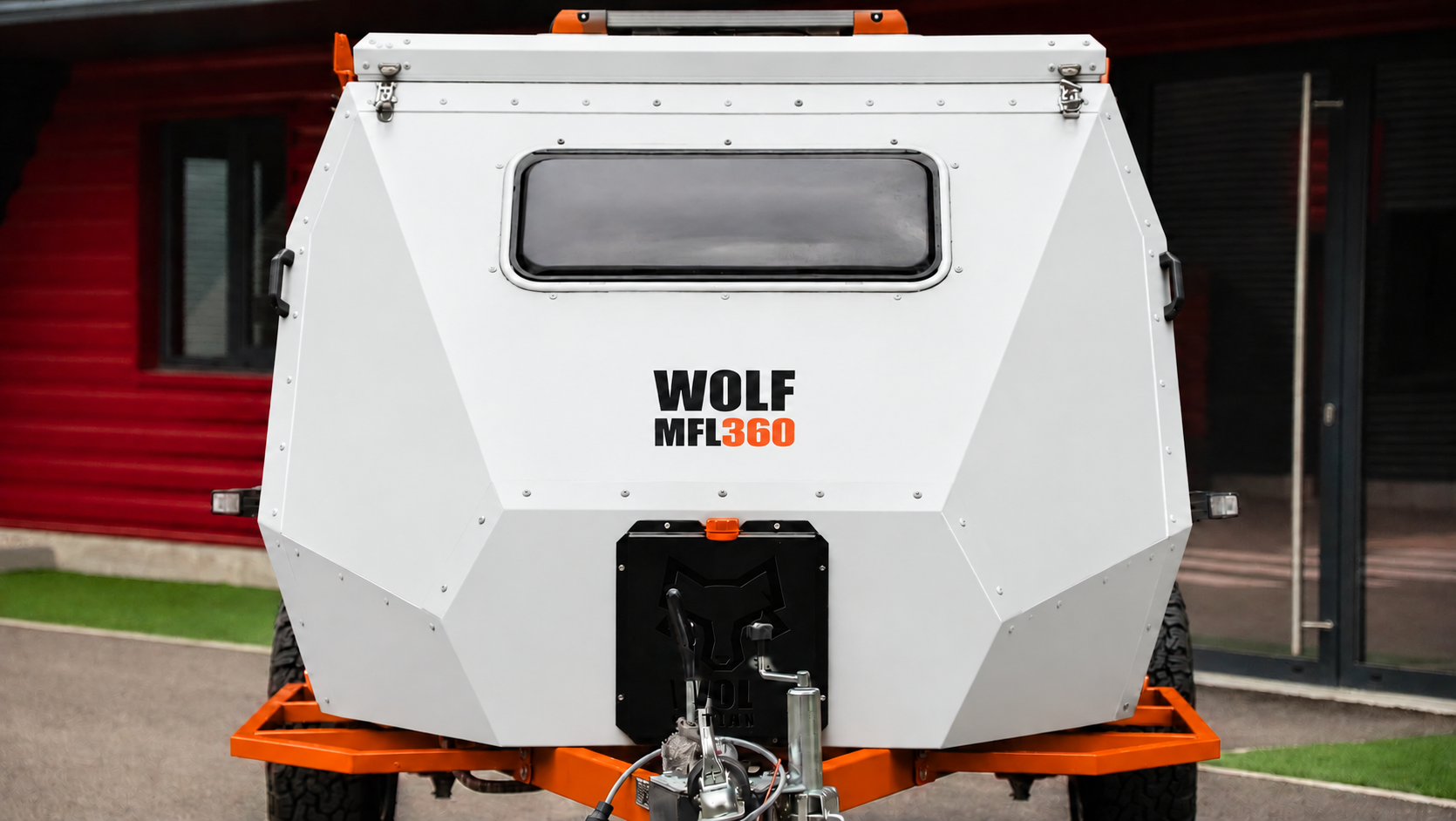 Front view of WOLF MFL 360 caravan in glacier white, roof closed.