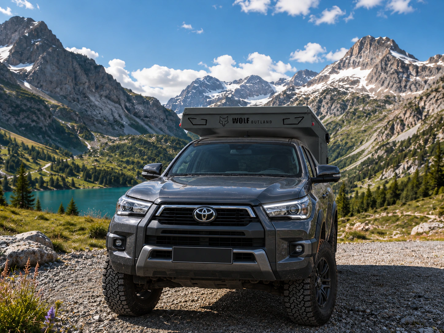 Toyota Hilux in anthracite grey with WOLF XMOD in Matt black, two solid rear cabinets — Front view, roof closed, Black engraving.
